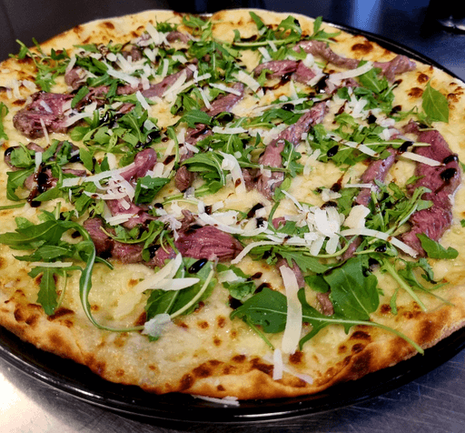 Carne di manzo,rucola,Grana,glassa al balsamico base bianca
