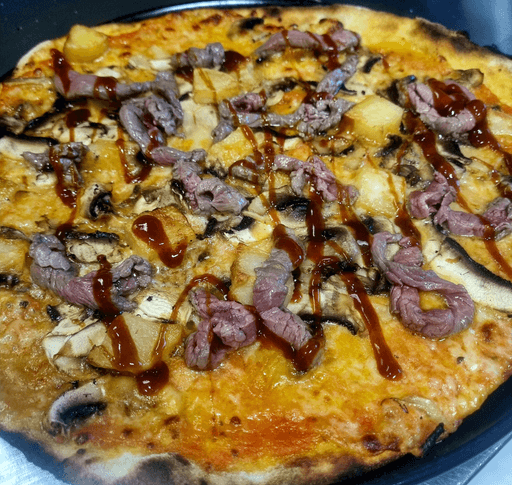 Tagliata di manzo,funghi,patate al forno e salsa bbq